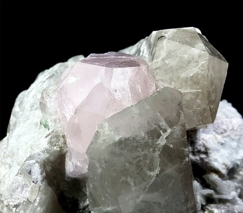 Blue tourmaline crystals on morganite combo specimen
Morganite lepidolite quartz specimen from Afghanistan