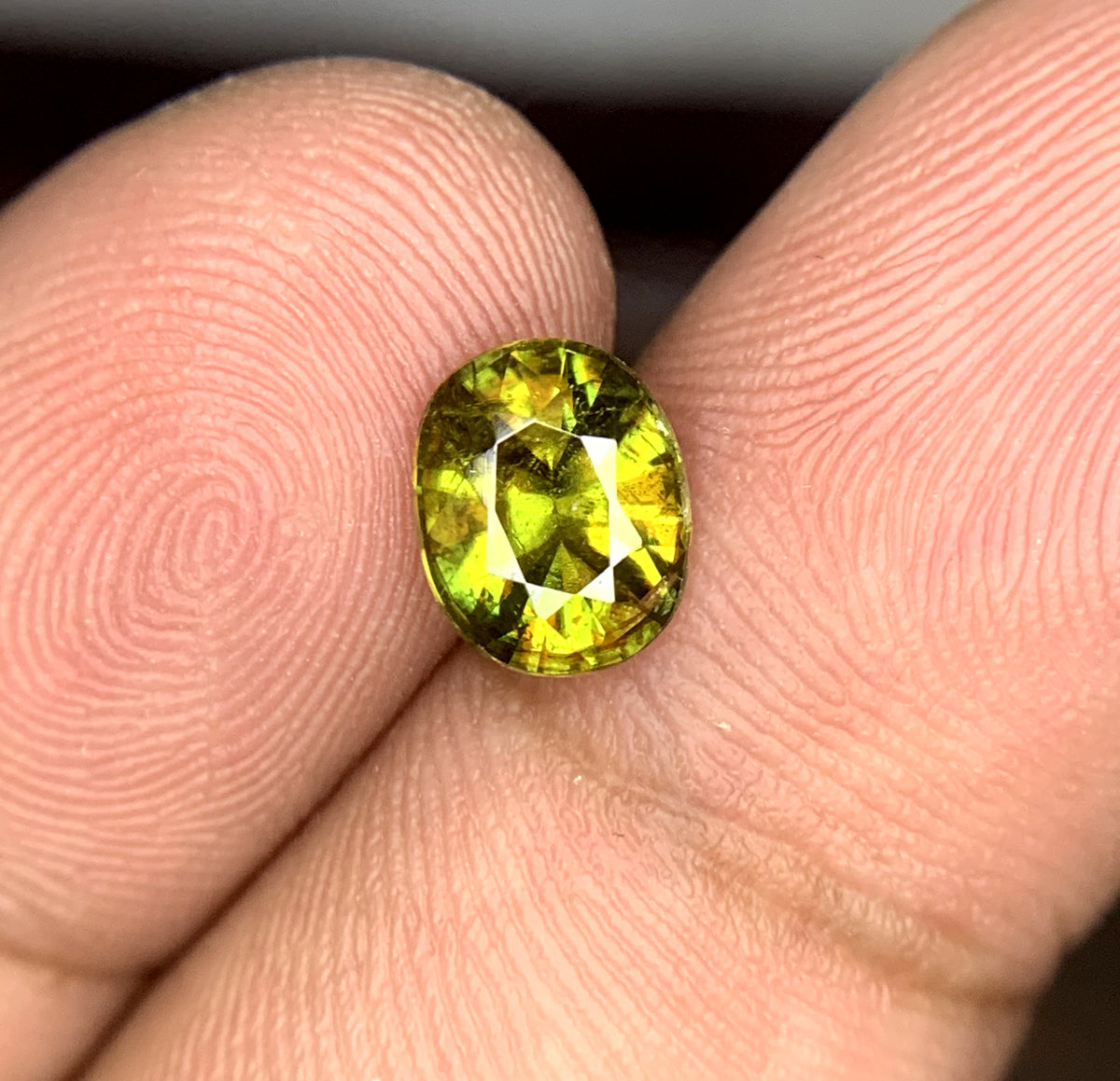 Natural sphene gemstone, full fire display angle
Sphene loose stone, 1.10 CT, Pakistan origin