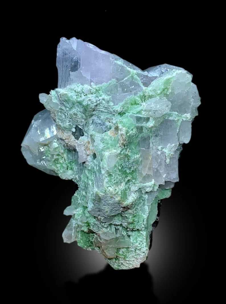 Raw kunzite crystal cluster from Afghanistan
Kunzite tourmaline specimen, top down view
Pink kunzite crystals showing natural clarity
Large kunzite combo specimen, display angle
Natural kunzite with tourmaline and DT quartz, back view
Kunzite specimen, full mineral association detail
Pink kunzite crystal cluster, Afghanistan origin