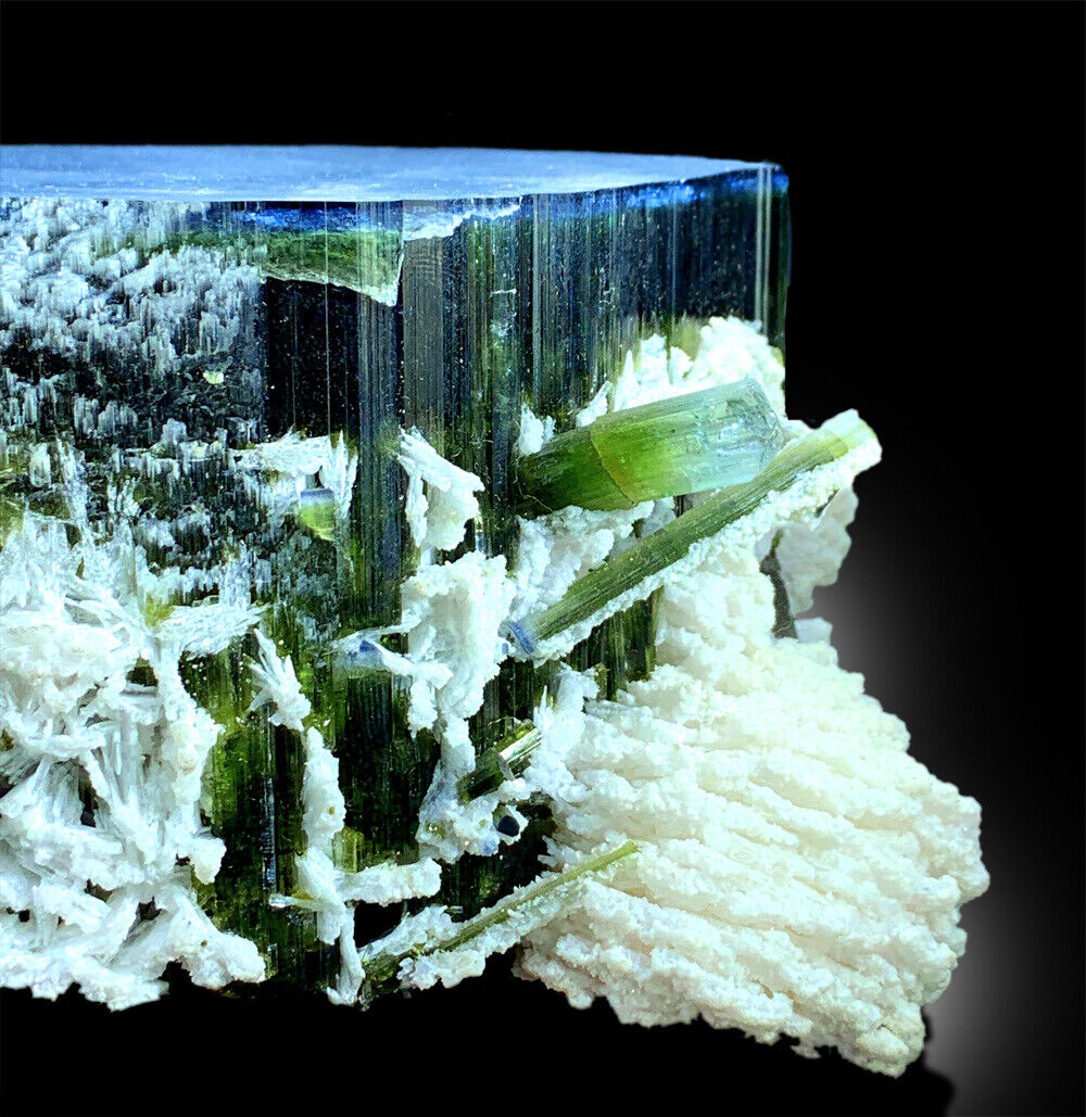 gemmy blue cap tourmaline crystal formation
raw green and blue tourmaline crystal cluster
