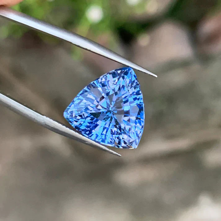 Real vs fake gemstones comparison showing natural and synthetic stone differences