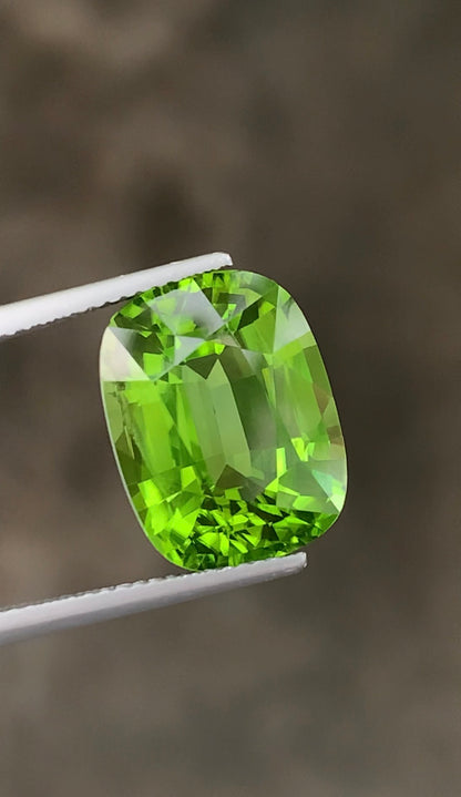 Peridot Gemstone, cushion cut 12.16 carats