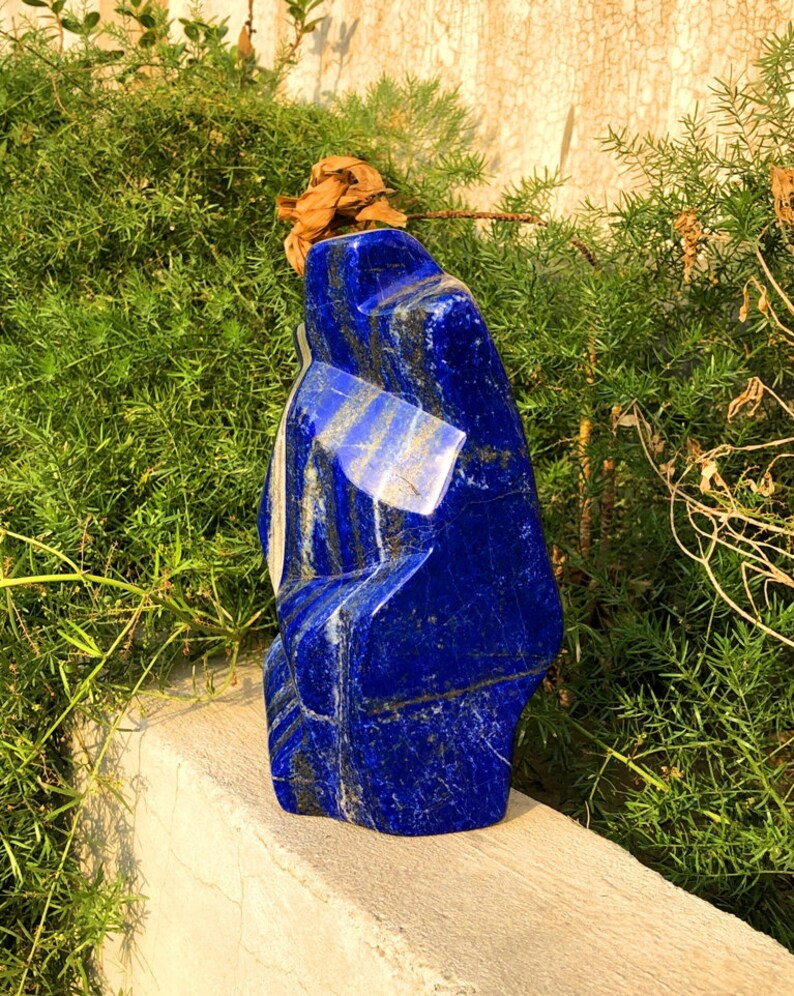 Deep blue lapis lazuli tumble with natural pyrite
3800 gram lapis lazuli polished freeform for sale