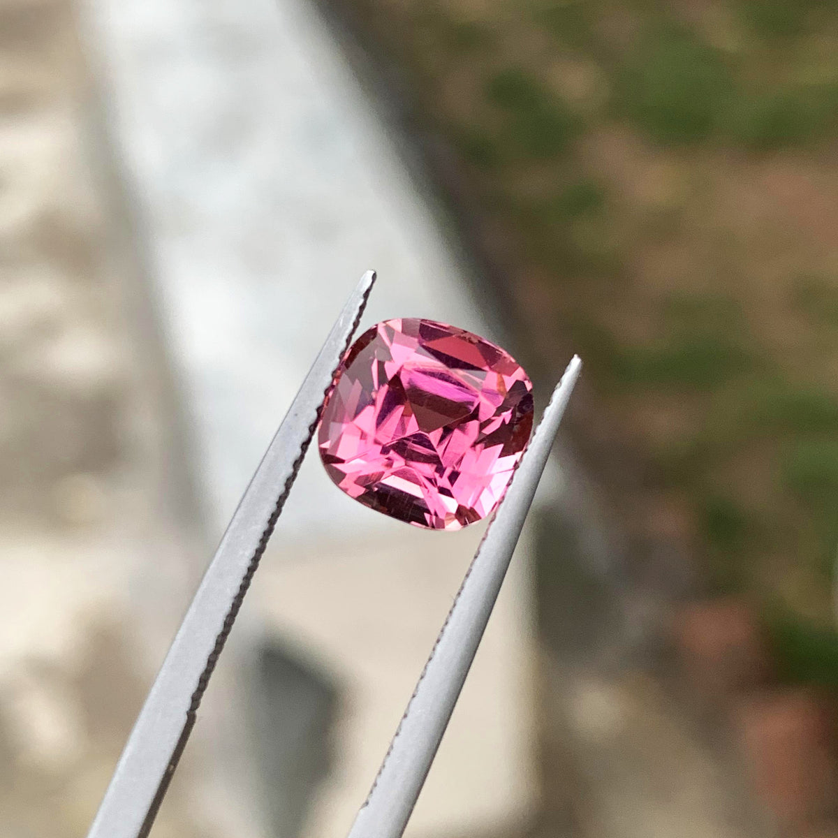 4.10 ct pink tourmaline, three-quarter angle
Unset pink gemstone with rounded square shape