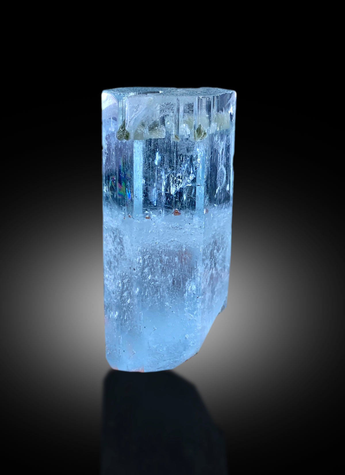 52 gram aquamarine crystal with an intact termination
Aquamarine crystal held up to show its transparency