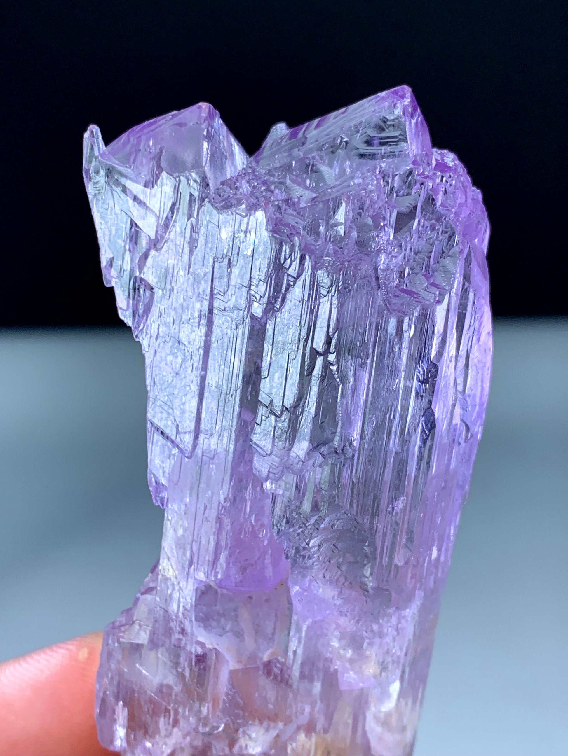Afghan kunzite etched surface texture close-up detail
Rare kunzite mountain peak termination face-up view
Natural pink kunzite crystal display specimen Afghanistan