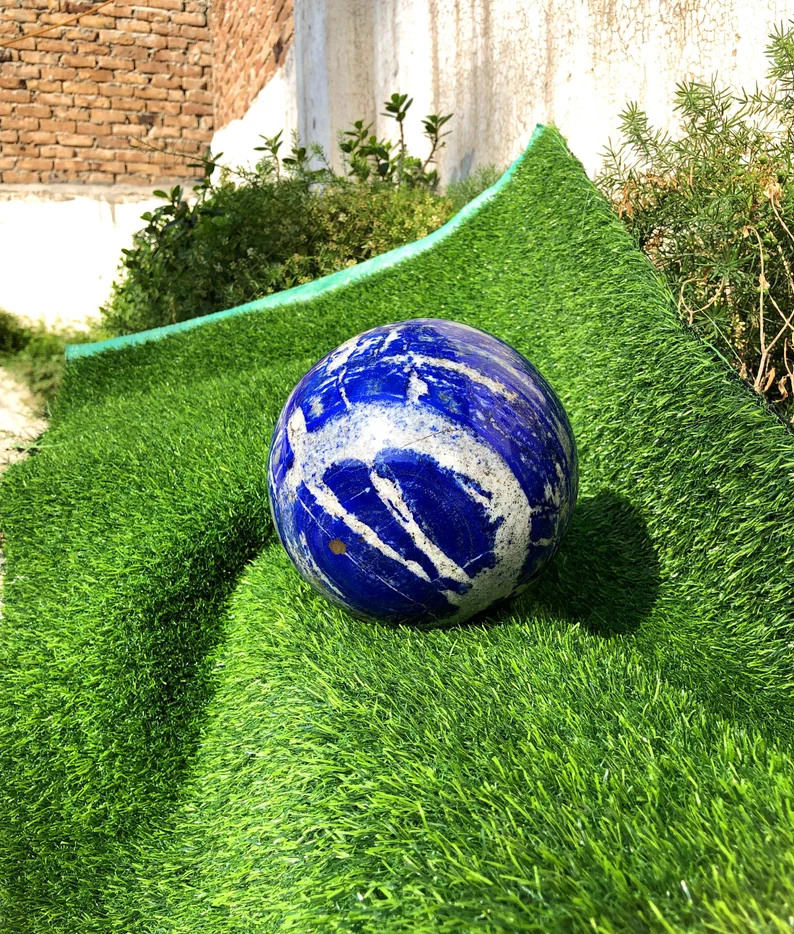 Afghan lapis lazuli polished sphere no dye
Lapis lazuli sphere meditation and feng shui piece
Lapis lazuli ball video still showing pyrite patterns