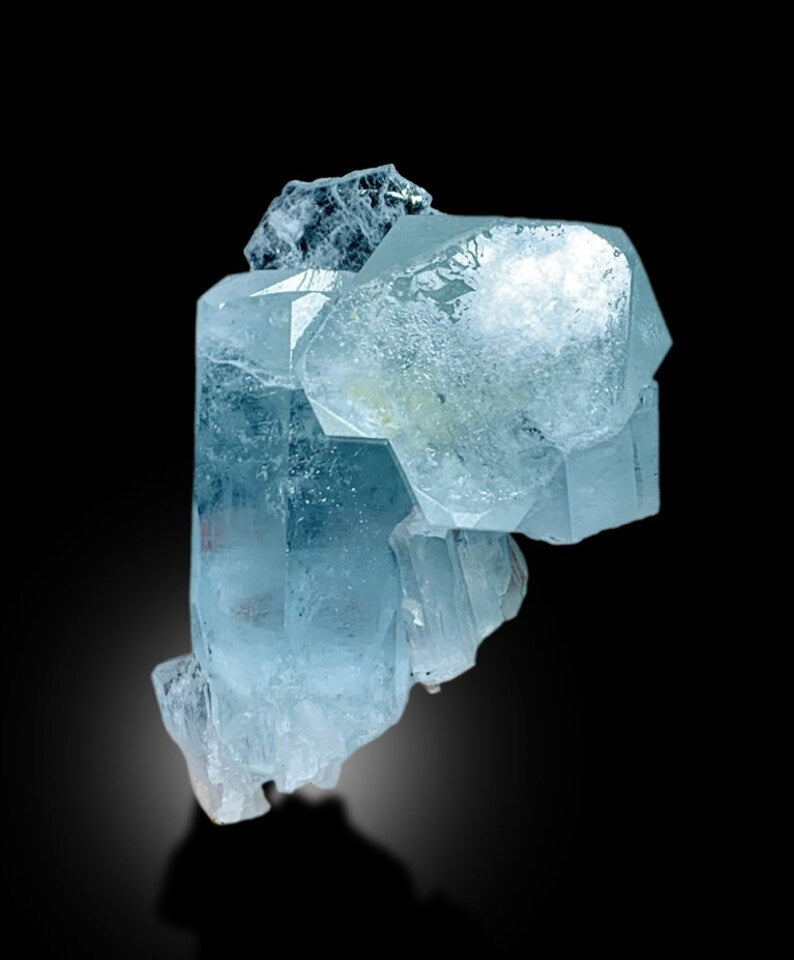Aquamarine crystal dimensions 72 by 55 by 49 mm
Sky blue aquamarine crystal back angle view