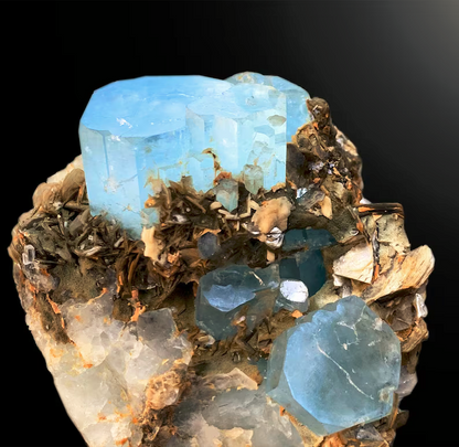 Aquamarine crystal faces showing blue color and luster
Gilgit Baltistan Pakistan aquamarine cluster detail
Natural untreated aquamarine crystal cluster specimen