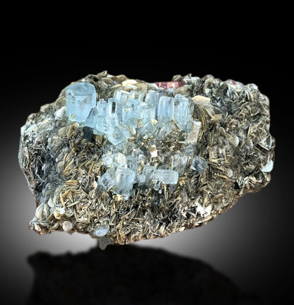 Aquamarine crystals with excellent luster, macro view
Natural aquamarine and apatite specimen, top view