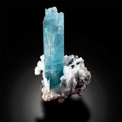 Closeup of aquamarine crystal termination and luster
Aquamarine specimen self standing side view