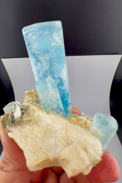 Aquamarine specimen with mica accents on feldspar