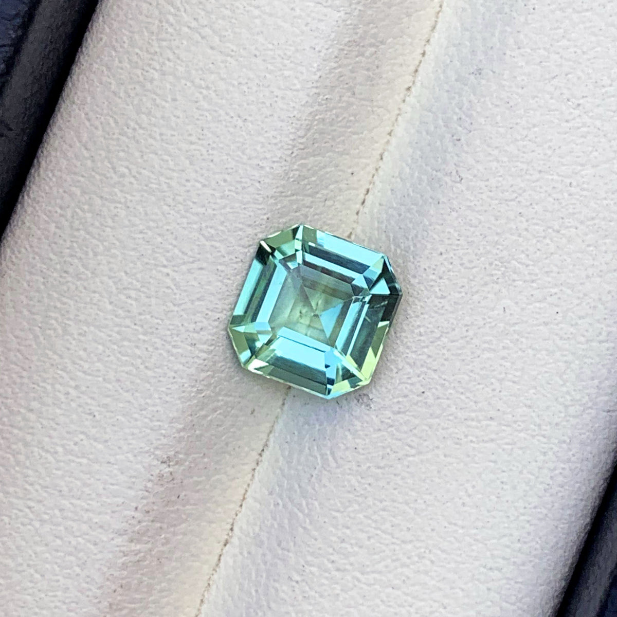 Natural tourmaline gemstone, side profile
Asscher cut sea foam tourmaline, top view