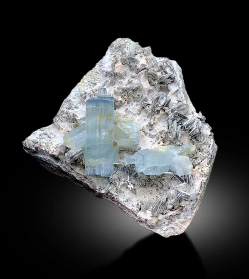 Blue cap aquamarine termination close-up color detail
Natural untreated aquamarine blue cap cluster display
Chumar Bakhoor aquamarine collector specimen for sale