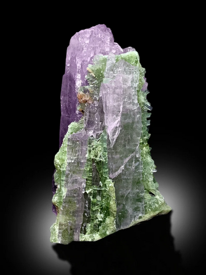 Collector grade kunzite specimen from Afghanistan
Kunzite tourmaline cluster lighting detail