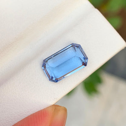 Deep blue aquamarine gemstone natural color close-up
Emerald cut aquamarine showing step facet color depth