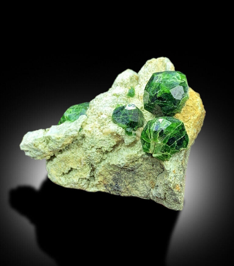 Collector grade Demantoid Garnet mineral specimen
Natural green garnet crystal cluster
Demantoid Garnet crystals with brilliant luster