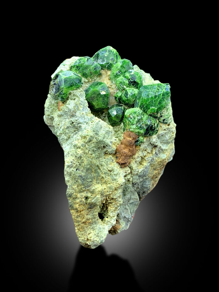 Natural green garnet cluster specimen
Demantoid Garnet crystals with excellent luster