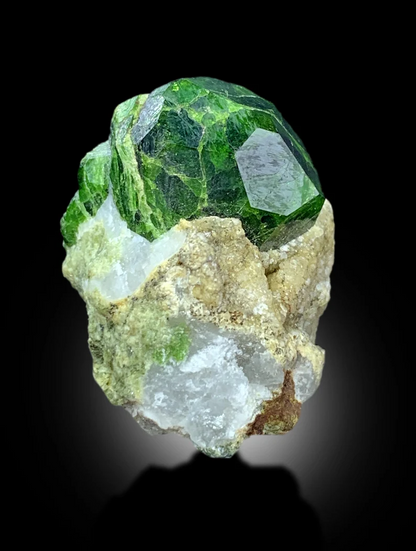 Demantoid garnet crystal faces showing green luster
Belqeys Mountain Afghanistan garnet detail view
Natural untreated demantoid garnet specimen