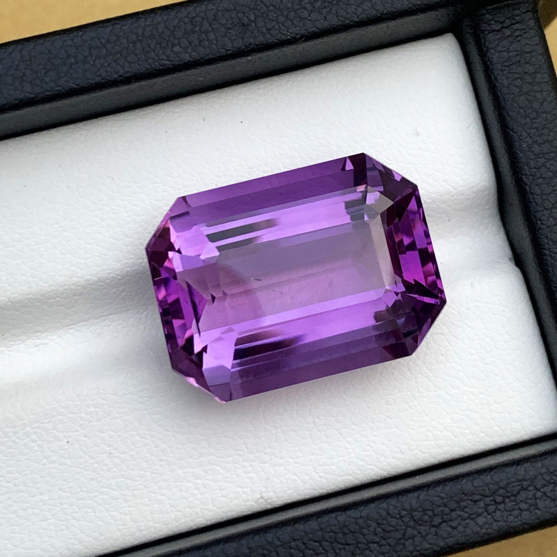 Emerald cut purple amethyst gemstone Brazil
Closeup of amethyst gemstone facets and clarity
