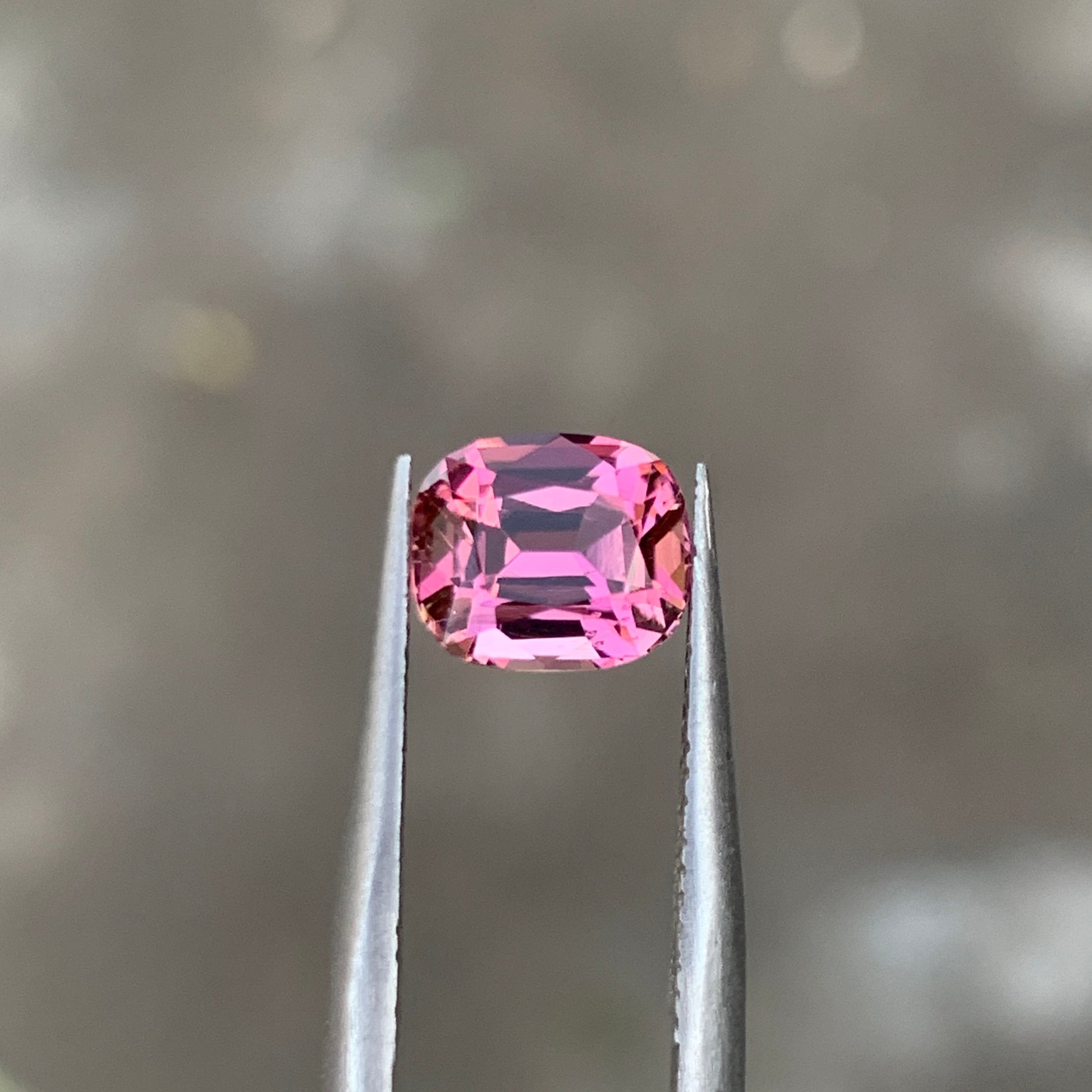 Flawless pink tourmaline ring stone 7x6mm close-up
Natural untreated pink tourmaline cushion cut profile