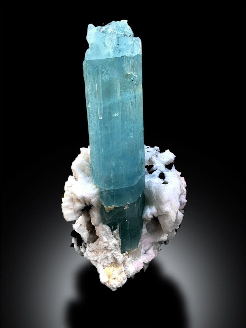 Terminated point of natural aquamarine crystal
Full profile of aquamarine schorl albite specimen