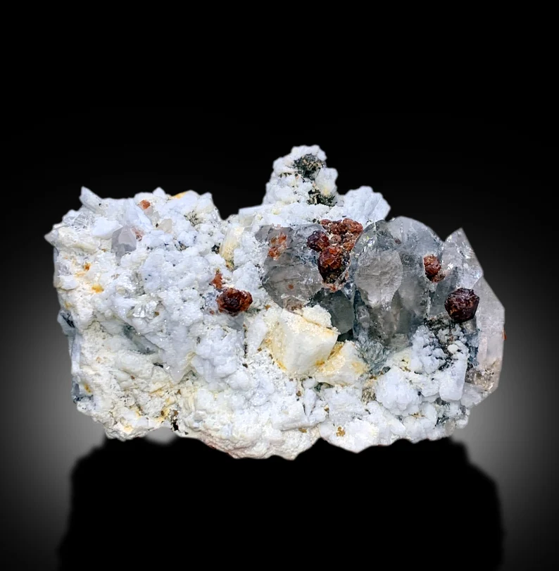 Garnet specimen from Skardu, Pakistan, macro detail
Natural red garnet cluster, angled display view
