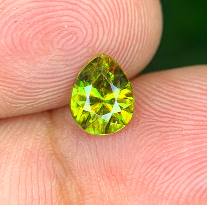 Green sphene from Skardu, Pakistan, macro shot
Natural pear cut sphene, angled view
Loose sphene gemstone for jewelry