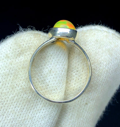 Large 26x20mm Ethiopian opal ring play-of-color
Natural opal ring showing rainbow color shift
Ethiopian opal sterling silver statement ring
