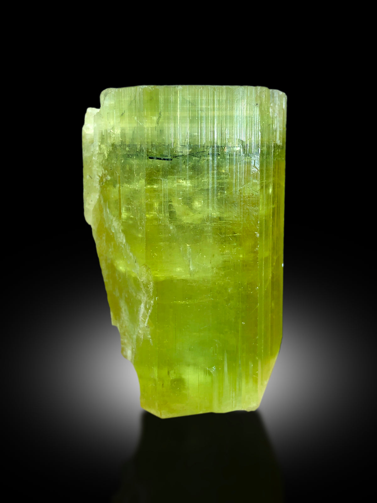 Heliodor crystal dimensions 51 by 31 by 29 mm
Yellow heliodor crystal back angle view
Golden yellow color detail on heliodor crystal