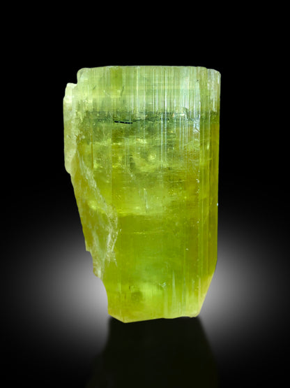 Heliodor crystal dimensions 51 by 31 by 29 mm
Yellow heliodor crystal back angle view
Golden yellow color detail on heliodor crystal