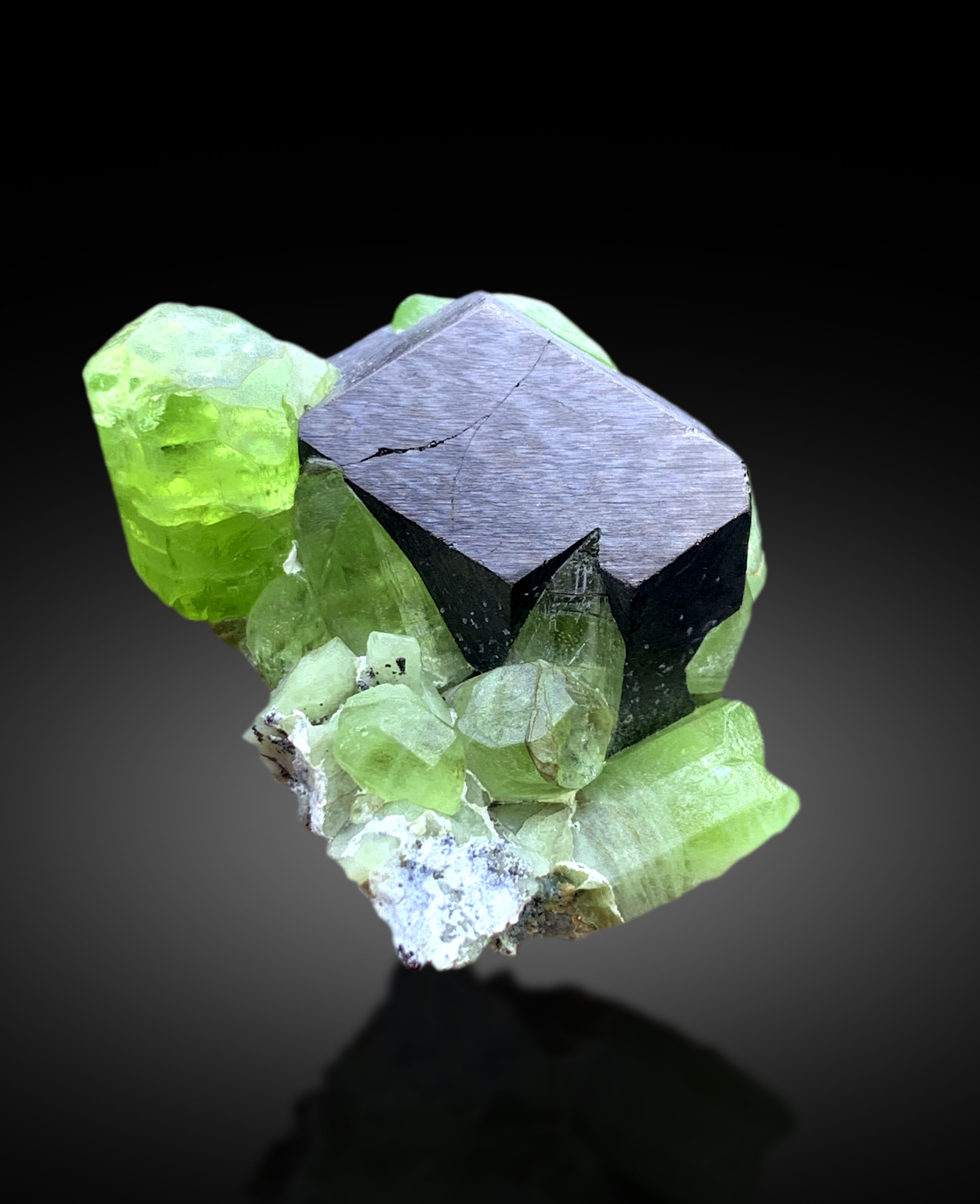 Lush Green Peridot with Magnetite from Supat valley Pakistan - 51 gram