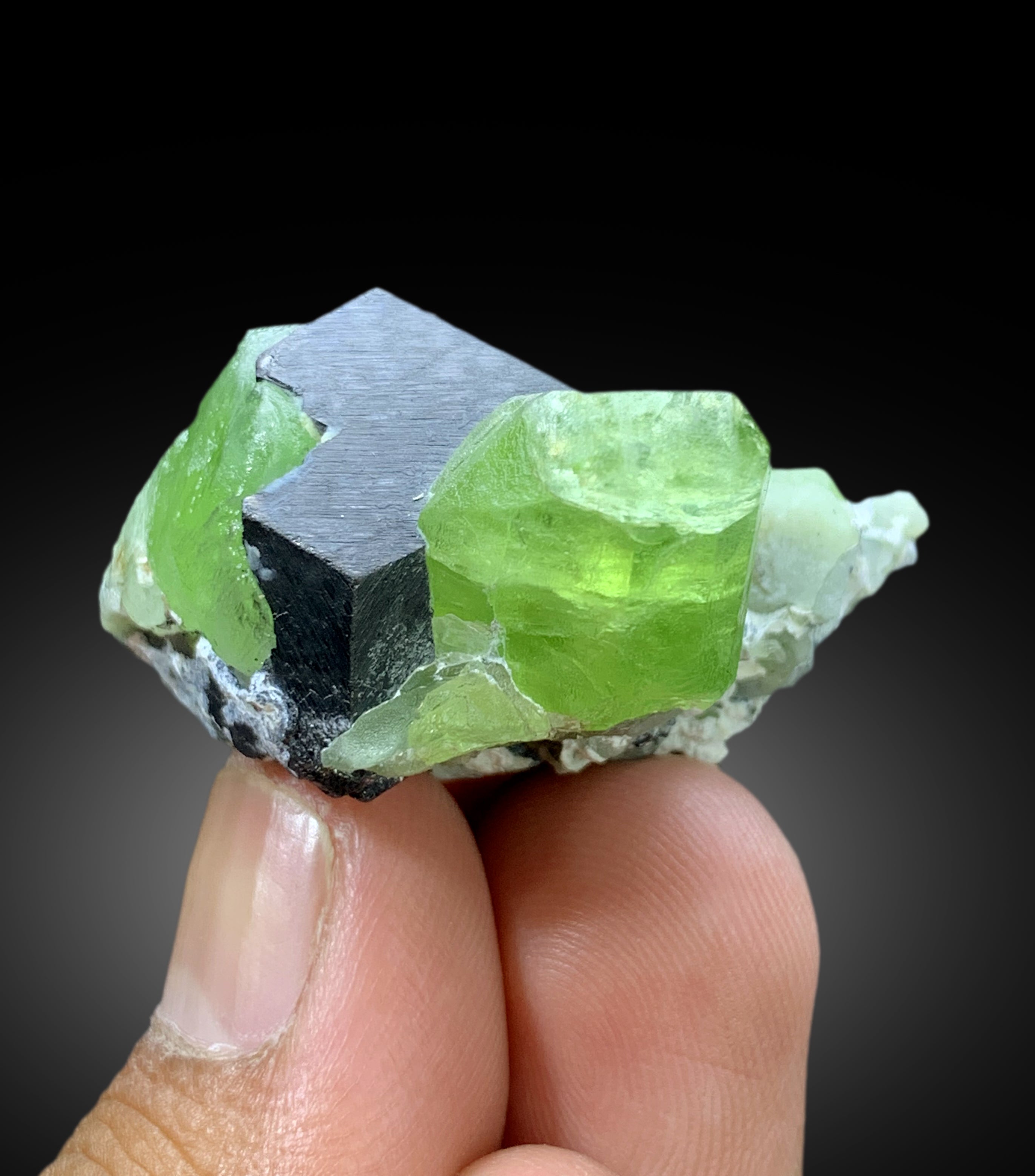 Lush Green Peridot with Magnetite from Supat valley Pakistan - 51 gram