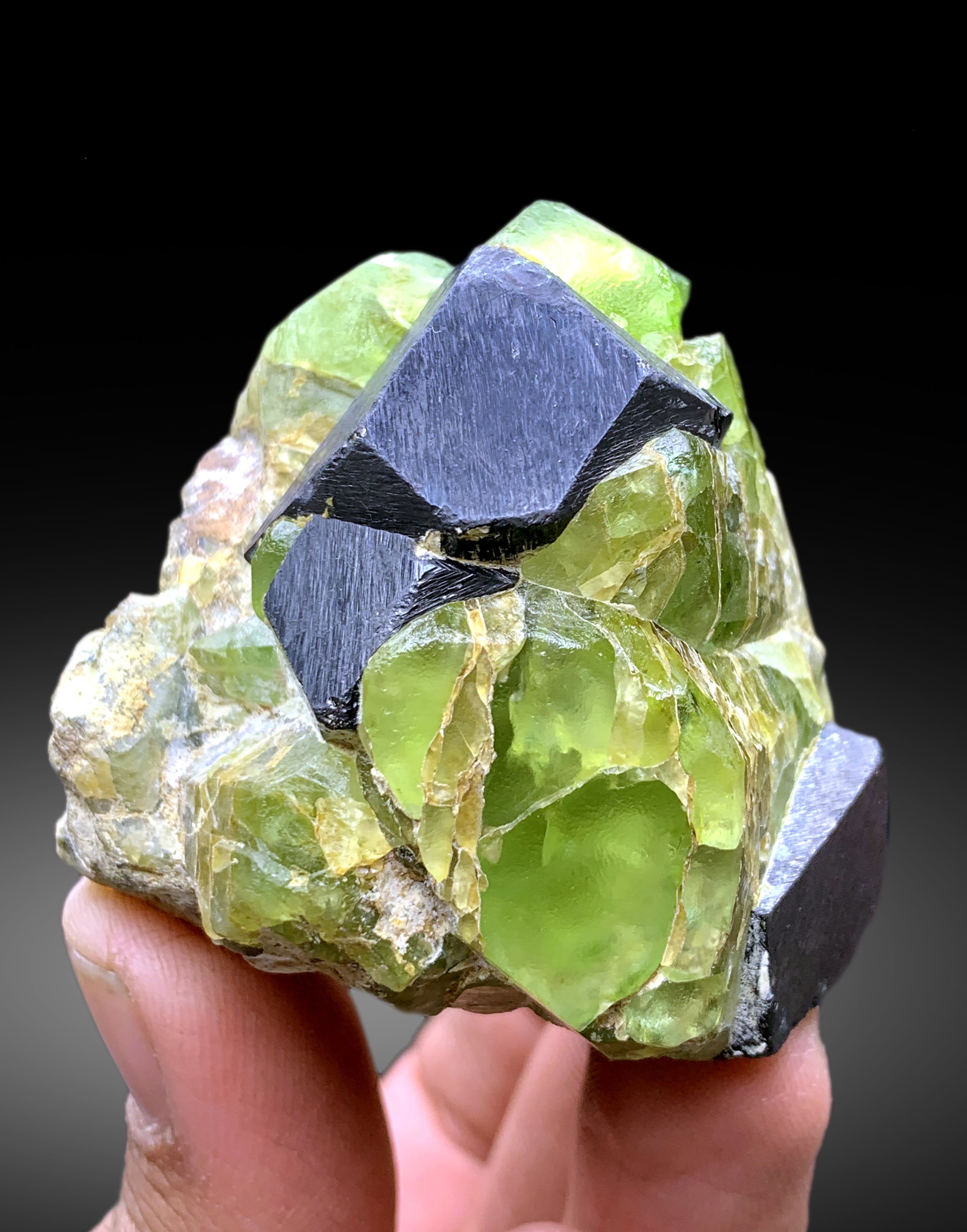 Lush Green Peridot with Magnetite from Pakistan - 185 gram