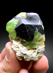 Lush Green Peridot with Magnetite from Pakistan - 70 gram