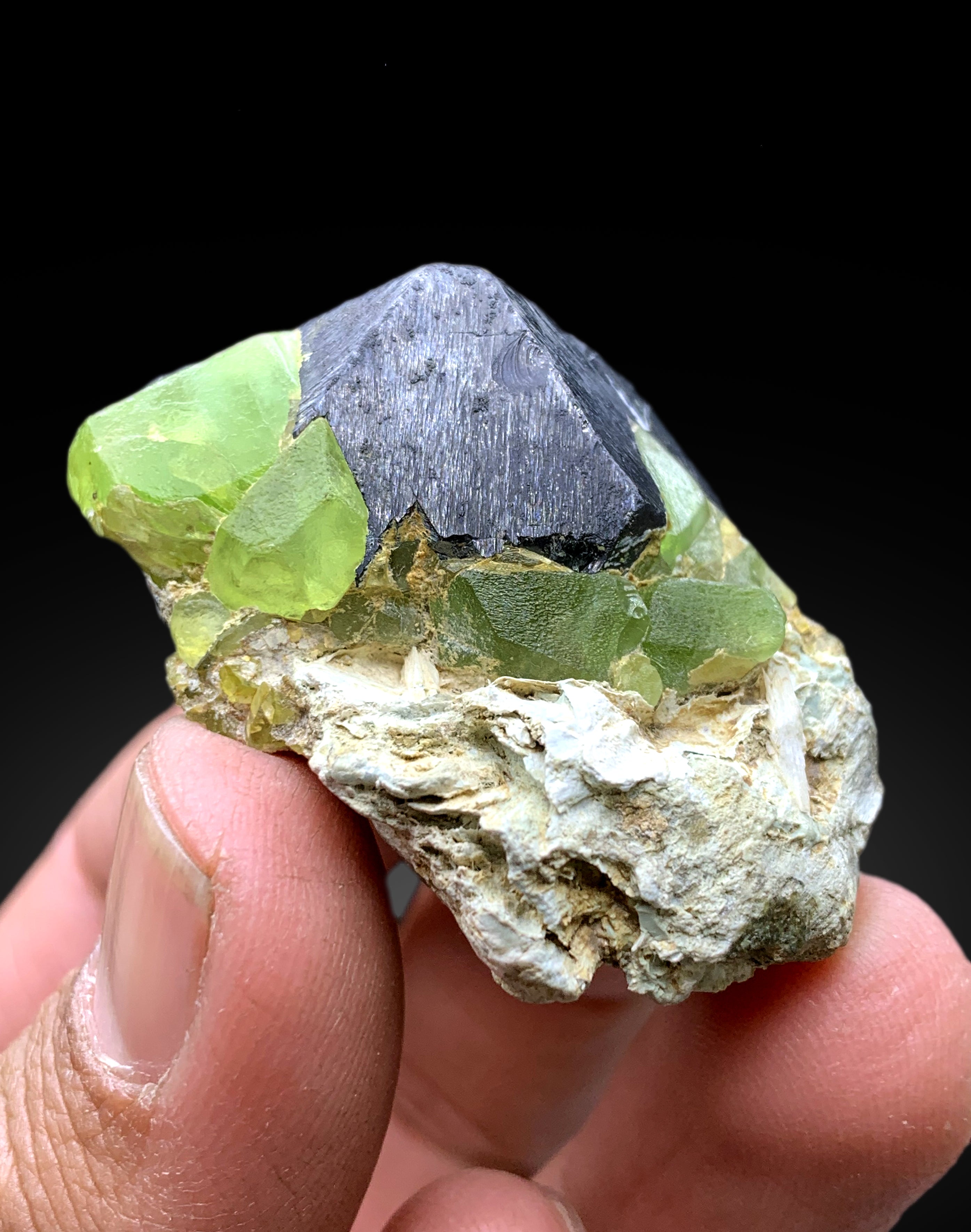 Lush Green Peridot with Magnetite from Pakistan - 70 gram