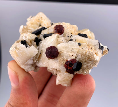 Red Garnet and Schorl Tourmaline Crystals on Feldspar From Pakistan - 112 Grams