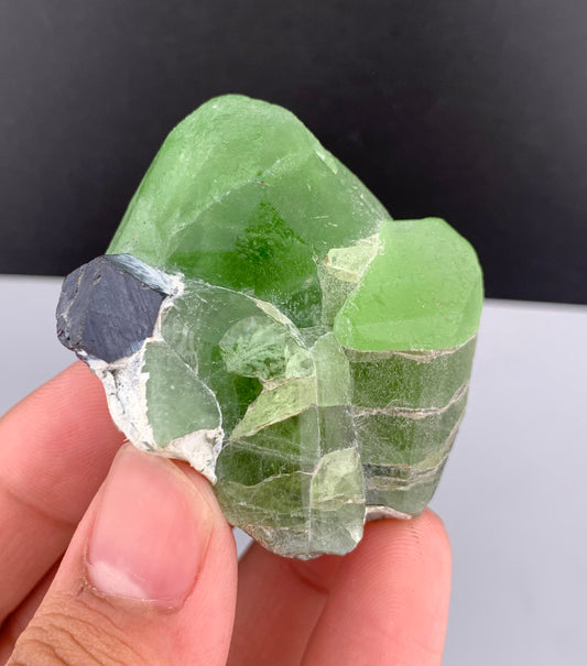 Lush Green Peridot Crystal With Magnetite From Pakistan - 60 Grams