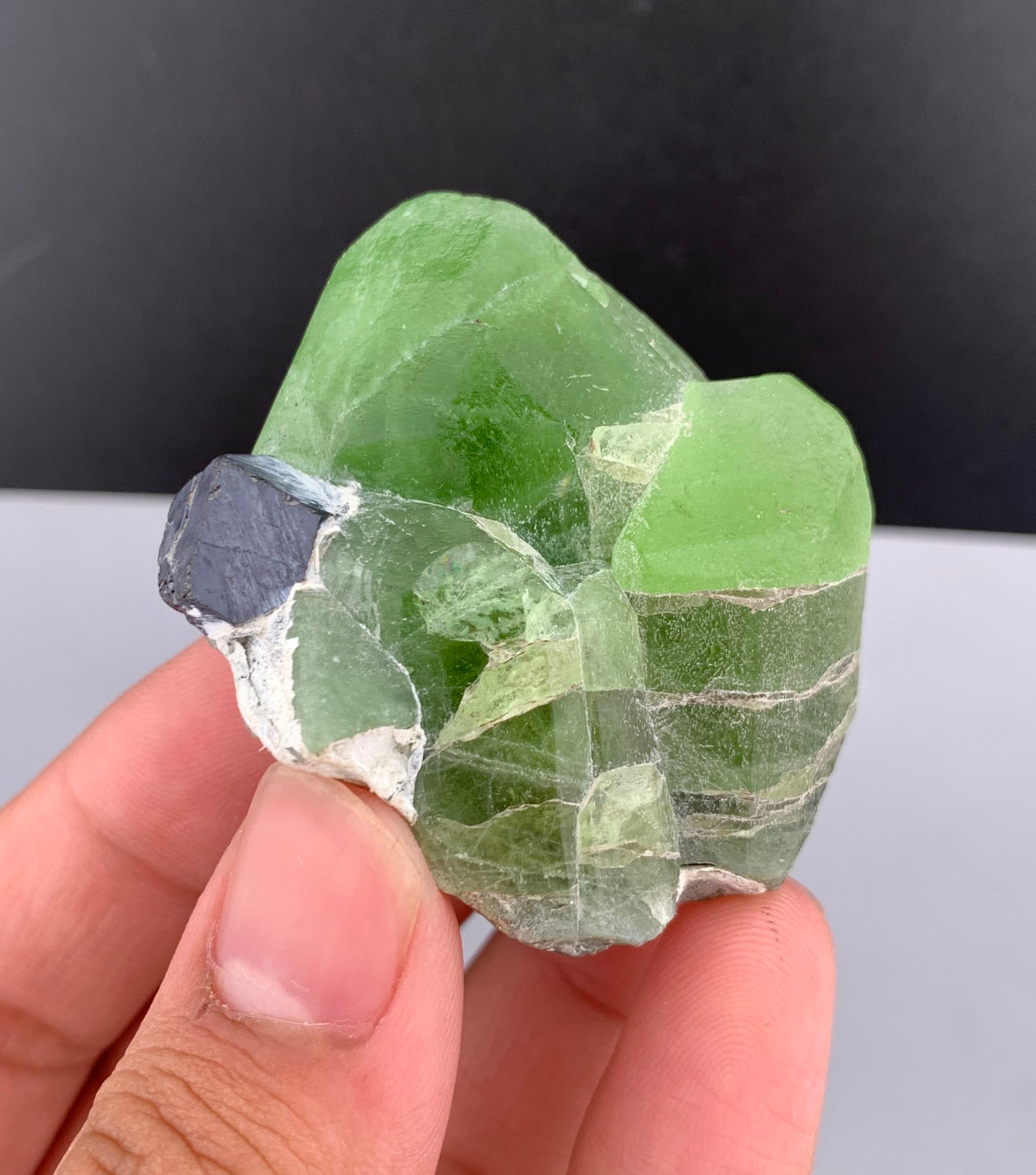 Lush Green Peridot Crystal With Magnetite From Pakistan - 60 Grams