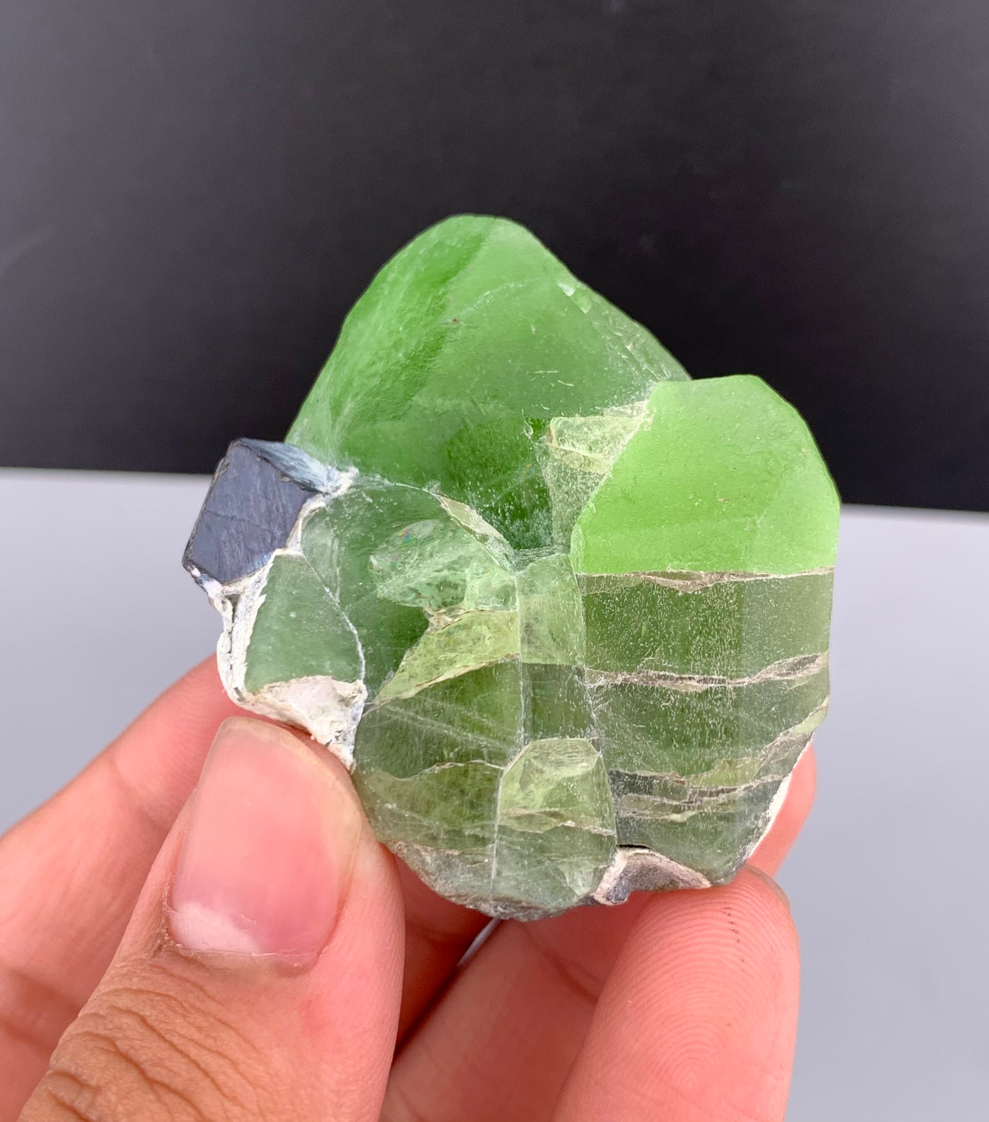 Lush Green Peridot Crystal With Magnetite From Pakistan - 60 Grams