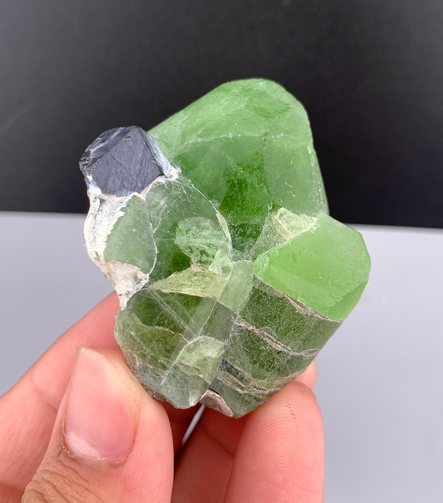 Lush Green Peridot Crystal With Magnetite From Pakistan - 60 Grams