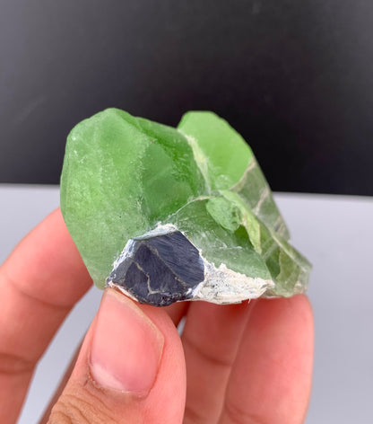 Lush Green Peridot Crystal With Magnetite From Pakistan - 60 Grams
