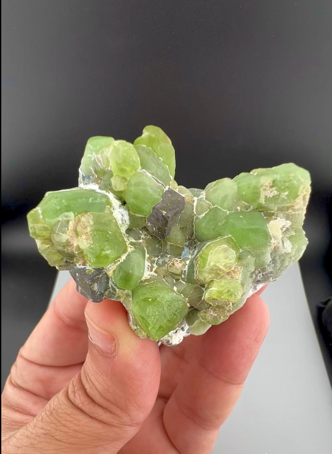 Green Peridot Crystals With Magnetite From Pakistan - 85 Grams