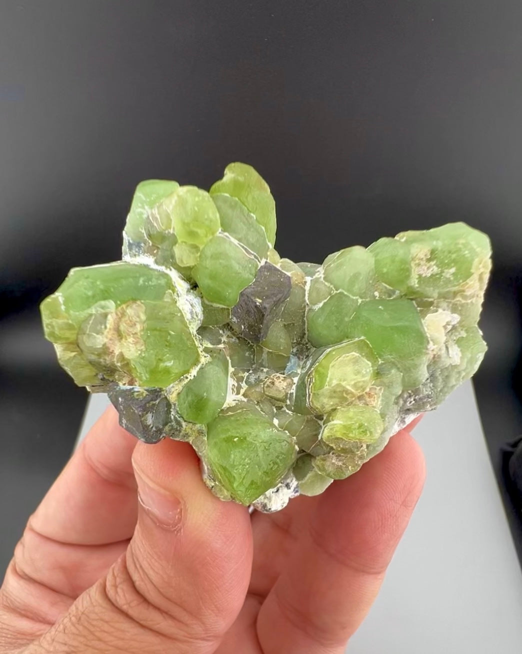 Green Peridot Crystals With Magnetite From Pakistan - 85 Grams
