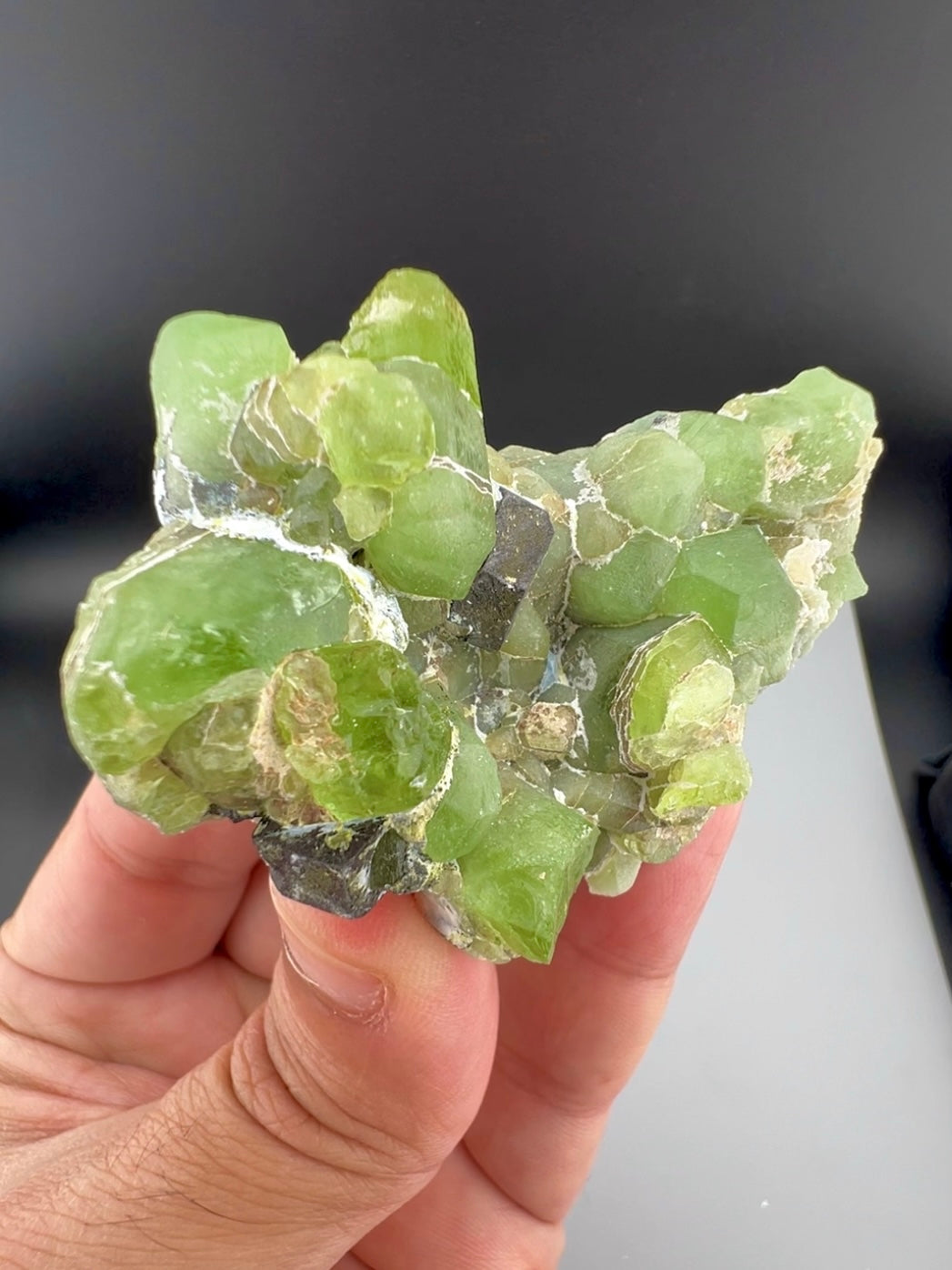 Green Peridot Crystals With Magnetite From Pakistan - 85 Grams