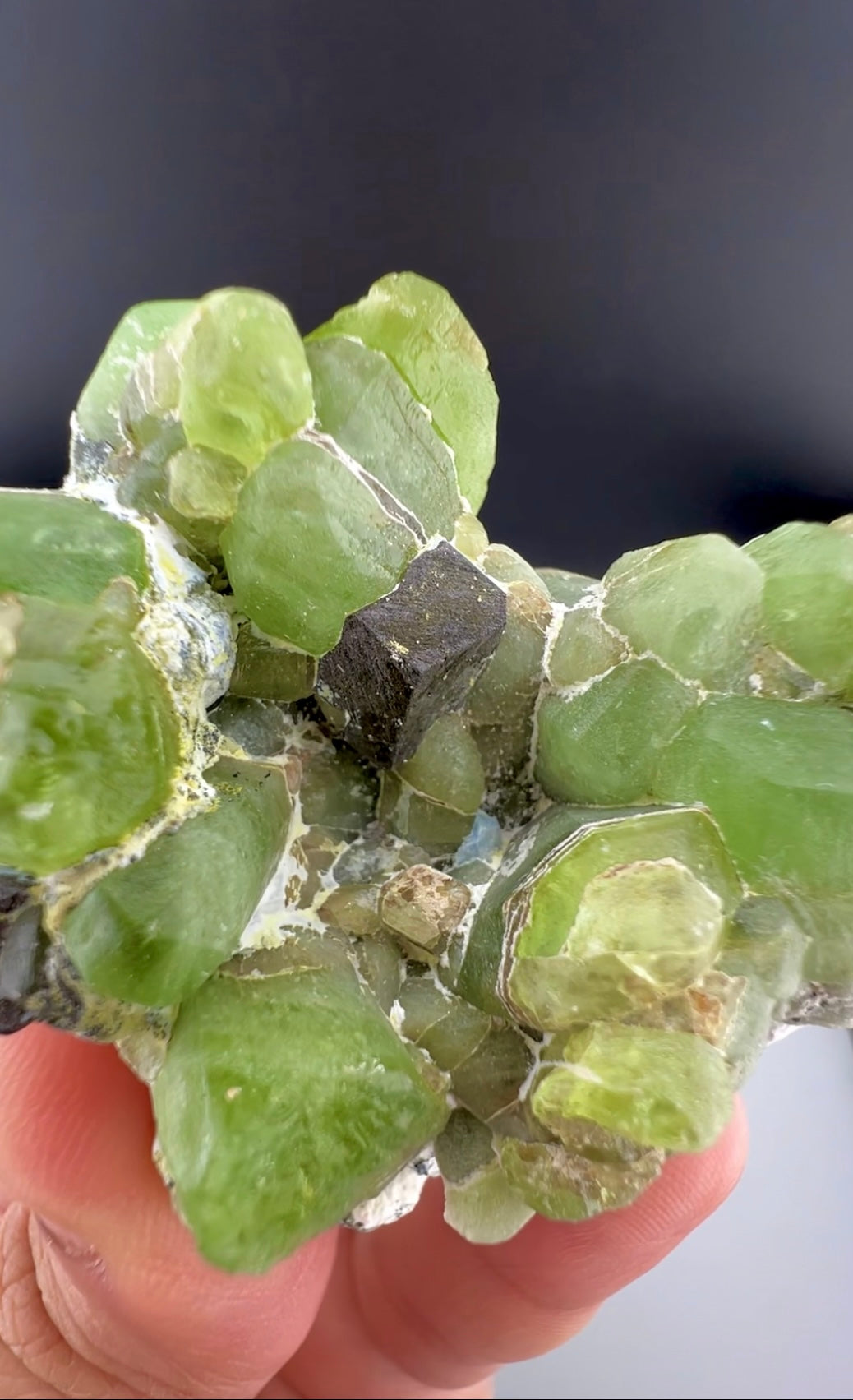 Green Peridot Crystals With Magnetite From Pakistan - 85 Grams