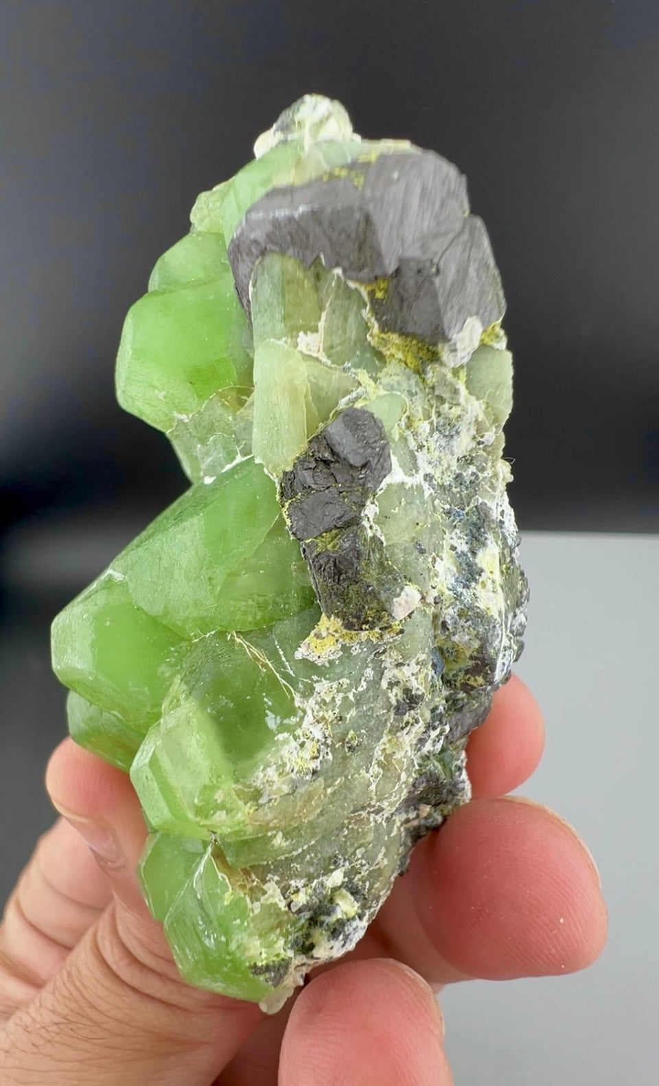 Green Peridot Crystals With Magnetite From Pakistan - 97 Grams