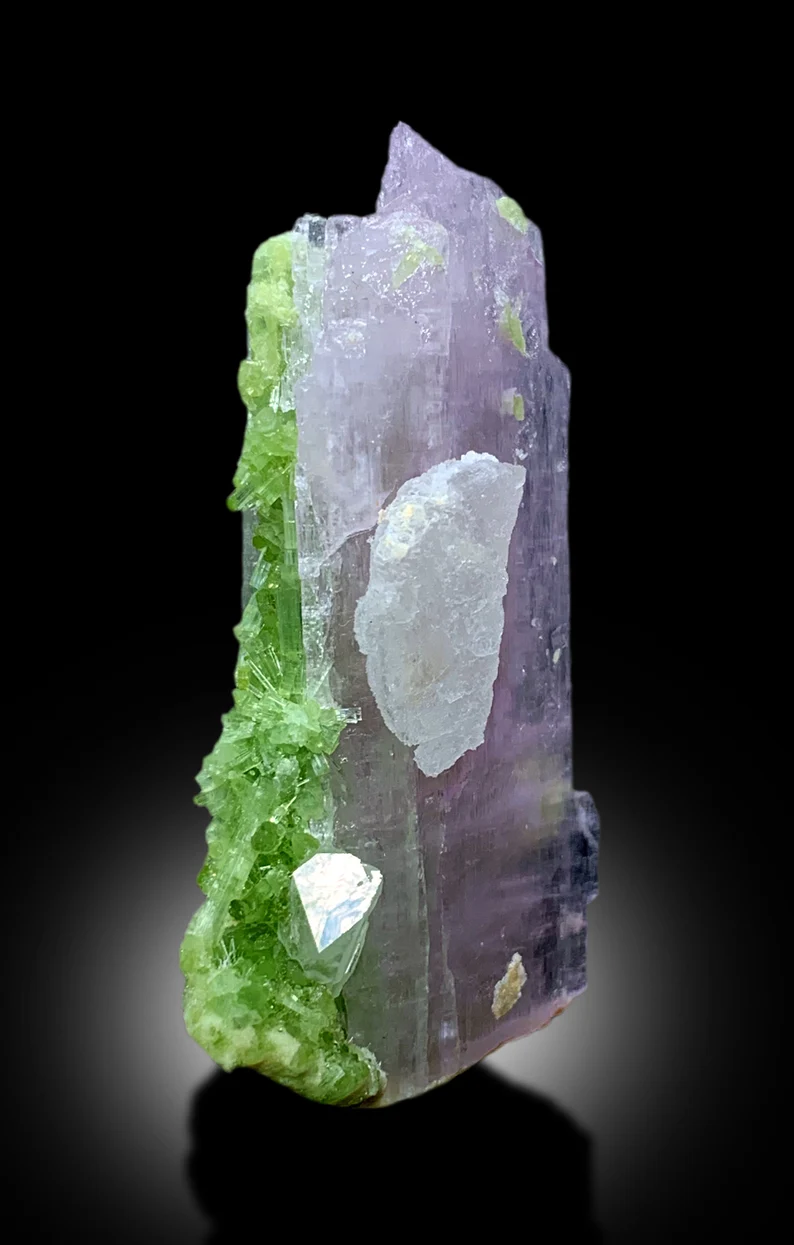 Kunzite tourmaline cluster with scale reference
Small pink kunzite crystal detail view