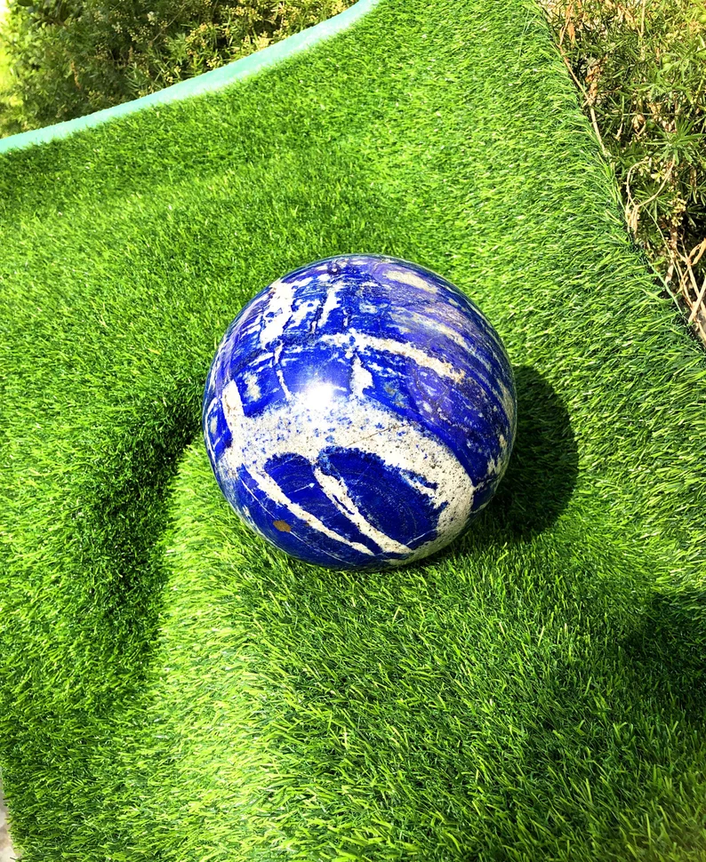 Lapis lazuli sphere meditation and feng shui piece
Lapis lazuli ball video still showing pyrite patterns