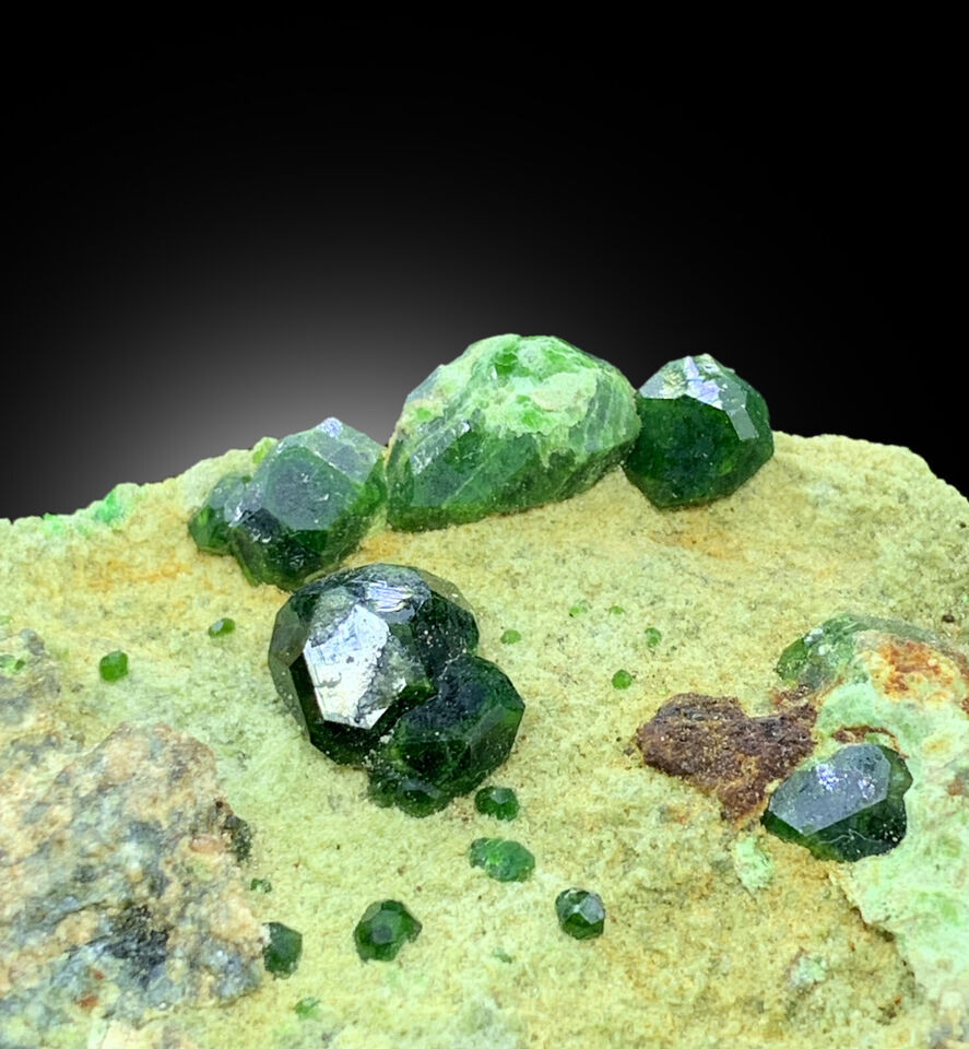 Collector grade Demantoid Garnet mineral specimen
Lush green garnet crystals with excellent luster
Large garnet crystal formation on matrix